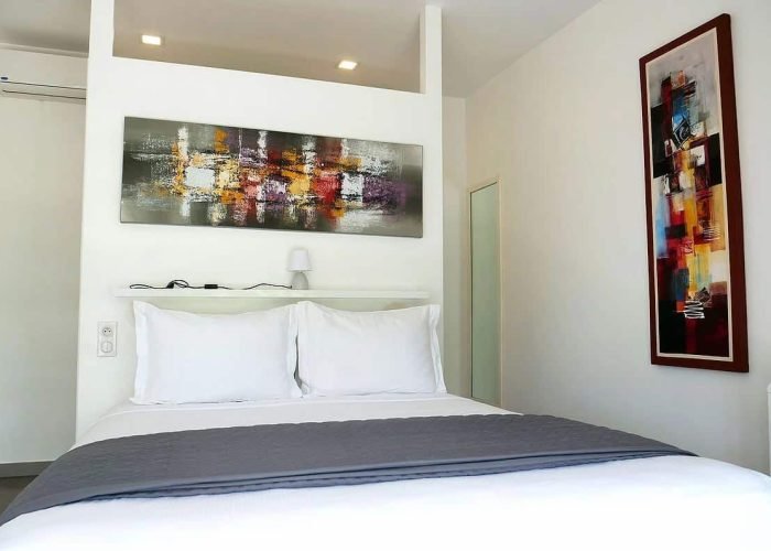 Résidence Moorea Sunset Beach. Grand lit double dans une Suite Jardin.