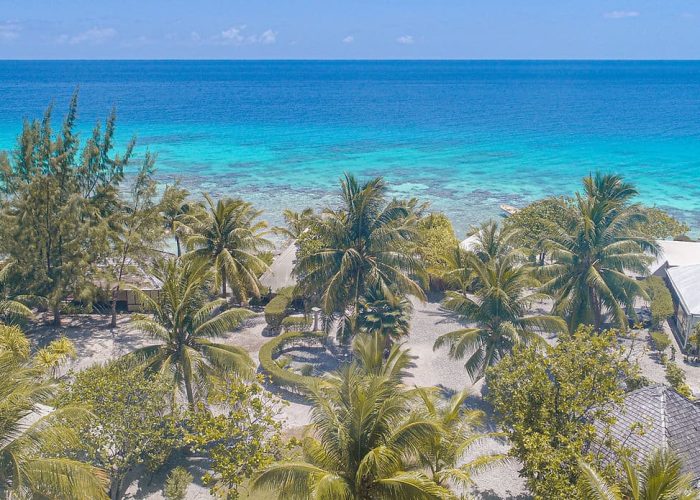 Pension Te Vahine Dream à Rangiroa - Vue aérienne sur la pension et le lagon turquoise.