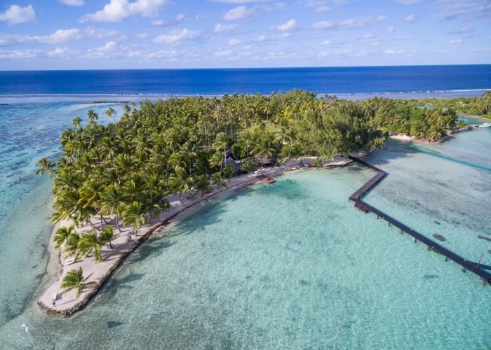 subtiles-tahiti-tahaa-hotel-vahine-island-8©vahine-island Hôtel Vahine Private Island 4* à Taha’a - Vue aérienne sur le motu et le lagon. Océan en arrière plan.